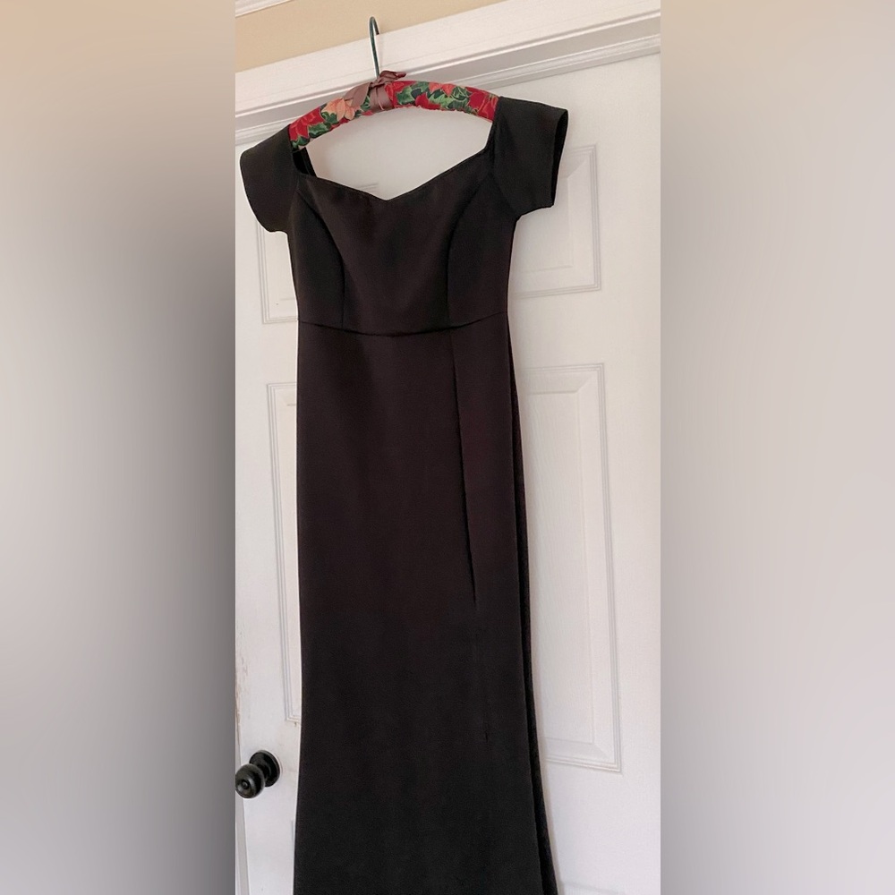 Literally no branding on this dress. Black mermaid style never worn